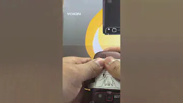Removing back cover and installing battery in Nokia 3710 fold mobile phone